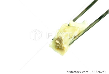 Gyuza stuffed mixed mushed pork and chicken on silver chopsticks in white background Gyuza stuffed mixed mushed pork and chicken on silver chopsticks in white background 58726245