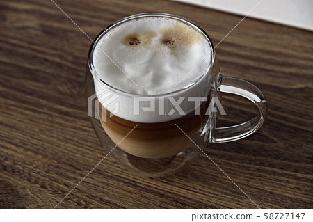 Transparent glass of latte Transparent glass of latte 58727147