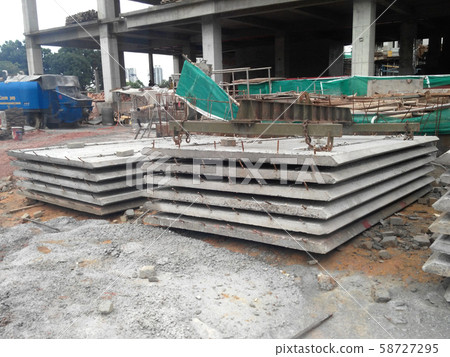Precast concrete slab fabricated at the factory and delivered to the site. It is one of the industrial building system methods to help speed up construction progress. Precast concrete slab fabricated at the factory and delivered to the site. It is one of the industrial building system methods to help speed up construction progress. 58727295