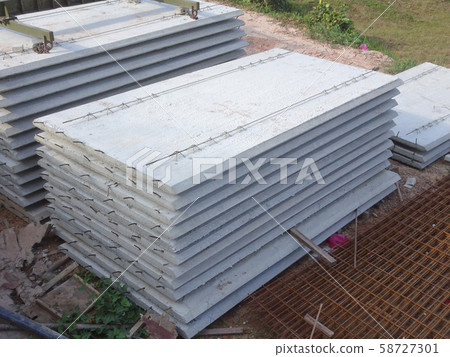 Precast concrete slab fabricated at the factory and delivered to the site. It is one of the industrial building system methods to help speed up construction progress. Precast concrete slab fabricated at the factory and delivered to the site. It is one of the industrial building system methods to help speed up construction progress. 58727301
