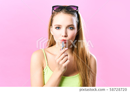 Close up cropped shot of femenine gorgeous charming adorable lady, with beautiful sexy lips, tube of 58728720