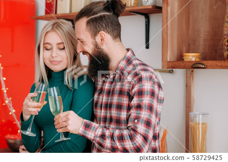 romantic home celebration guy champagne girlfriend 58729425