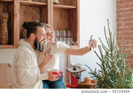 family morning leisure couple kitchen selfie 58729484