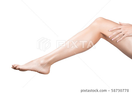 Female sexy leg with smooth skin. Woman puts her hand on hip, isolated on white. 58730778