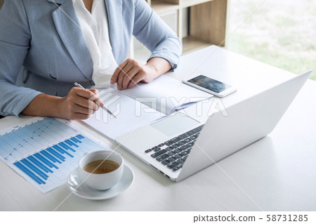 Business woman accountant financier working audit Business woman accountant financier working audit 58731285