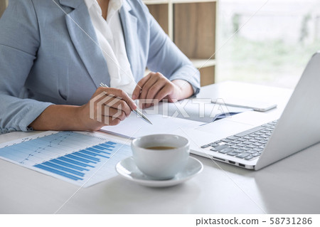 Business woman accountant financier working audit Business woman accountant financier working audit 58731286