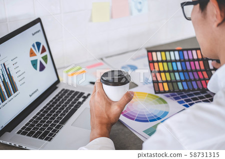 Young creative graphic designer working on project Young creative graphic designer working on project 58731315