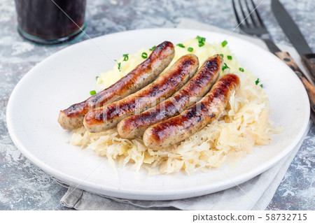Roasted nuremberg sausages Roasted nuremberg sausages 58732715