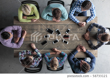 Business people not using smartphones 58733121