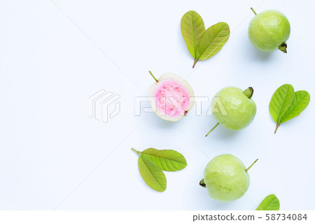 Fresh ripe guava and slices with leaves. Top view 58734084