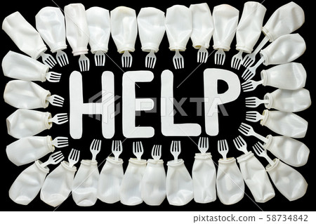 Help - concept to the problem of the environment disposable tableware and packaging. Disposable forks, plastic bottles and the word help on a black isolated background Help - concept to the problem of the environment disposable tableware and packaging. Disposable forks, plastic bottles and the word help on a black isolated background 58734842