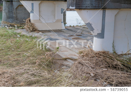 Kanogawa, Izunokuni-shi, Shizuoka Prefecture Drifting garbage caught on the pier of Chitose Bridge after the typhoon 58739055