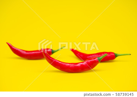 Close up red hot chili spur pepper at white background Close up red hot chili spur pepper at white background 58739145