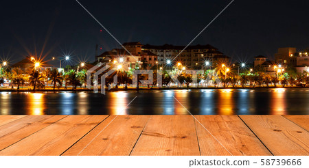 perspective wooden board over cityscape perspective wooden board over cityscape 58739666