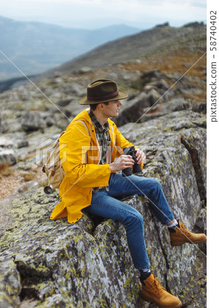 breaking the monotony of life. hiker learning different places 58740402