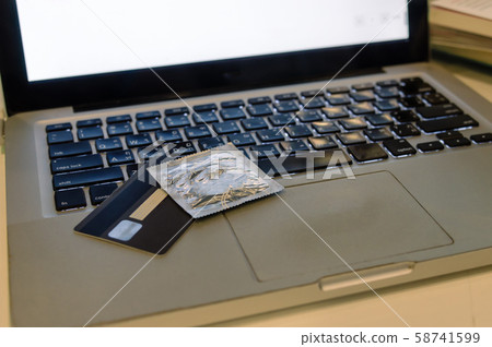 condom on laptop condom on laptop 58741599