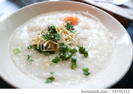rice gruel or congee with egg and pork rice gruel or congee with egg and pork 58745312