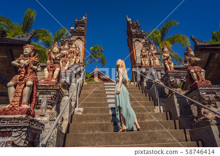 Young woman tourist in budhist temple Brahma Vihara Arama Bali Young woman tourist in budhist temple Brahma Vihara Arama Bali 58746414