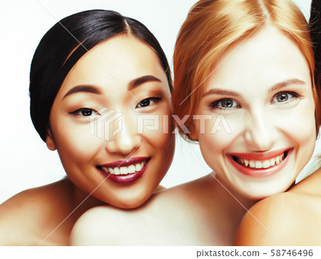 different nation woman: african-american, caucasian, asian together isolated on white background different nation woman: african-american, caucasian, asian together isolated on white background 58746496