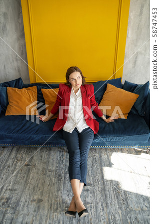 Relaxed young pretty female in stylish outfit Relaxed young pretty female in stylish outfit 58747453