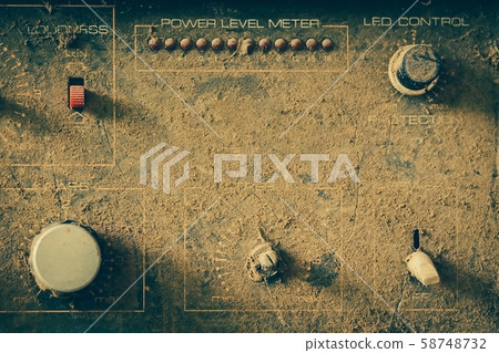 The old amplifiers damaged, placed on the table until the dust was captured. 58748732