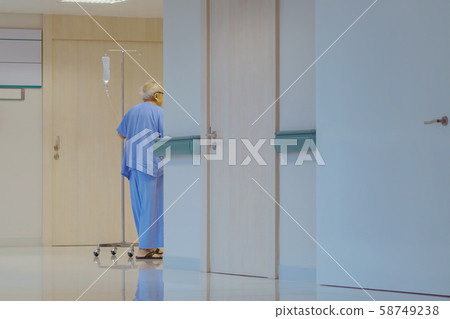 Male urinary tract patients walking for exercise and rest in the hospital 58749238