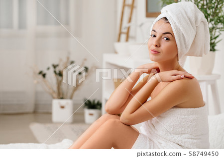 beautiful young woman with bath towel beautiful young woman with bath towel 58749450