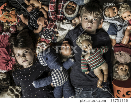 Creepy children with scary dolls 58751536