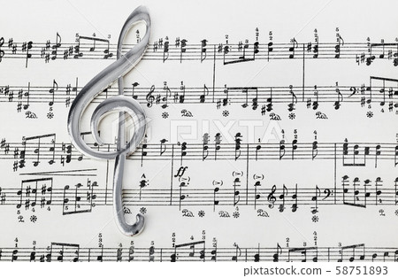 Treble clef on music sheet - musical background Treble clef on music sheet - musical background 58751893