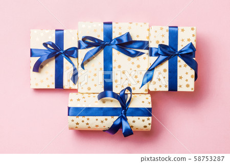 Gift box with blue bow for Christmas or New Year 58753287
