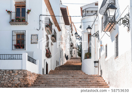 Street of a snow-white southern town on the hills, Altea, Spain 58753630