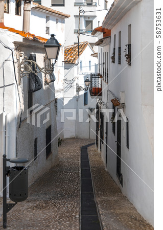 Streetscape. Cozy provincial street of a seaside town. Altea, Spain 58753631