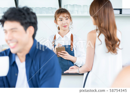 Female cafe clerk Female cafe clerk 58754345