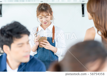 Female cafe clerk 58754358