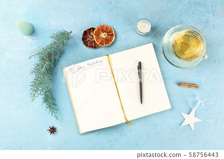 New Year's resolutions, flat lay overhead shot with the handwritten header and a place for text, on 58756443