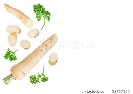 Parsley root with slices and leaves isolated on white background with copy space for your text. Top Parsley root with slices and leaves isolated on white background with copy space for your text. Top 58757103