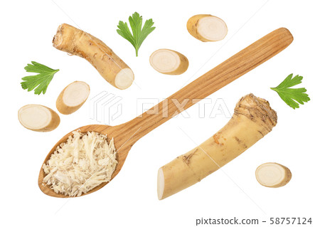 Horseradish root grated in spoon with slices isolated on white background 58757124