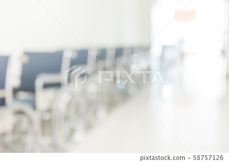 Blur abstract background view wheelchair seat row in empty hospital building interior Blur abstract background view wheelchair seat row in empty hospital building interior 58757126