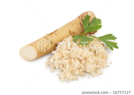Horseradish root with slices grated pile and parsley isolated on white background 58757127