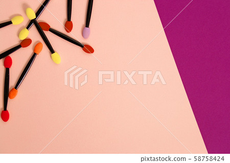 Professional makeup brush on colorful background Professional makeup brush on colorful background 58758424