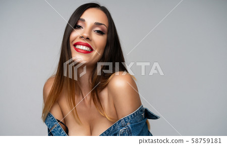 Beautiful caucasian girl in a denim jacket posing 58759181