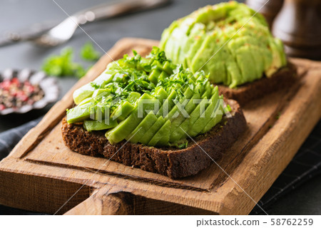 Avocado toast with rye bread Avocado toast with rye bread 58762259