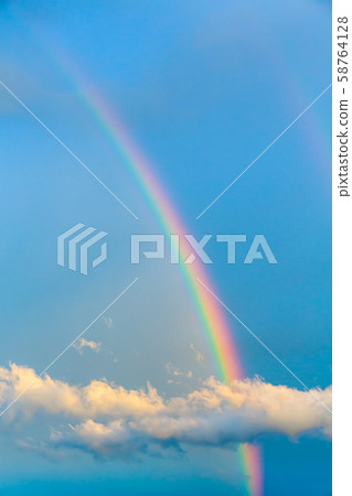 Rainbow and clouds Rainbow and clouds 58764128
