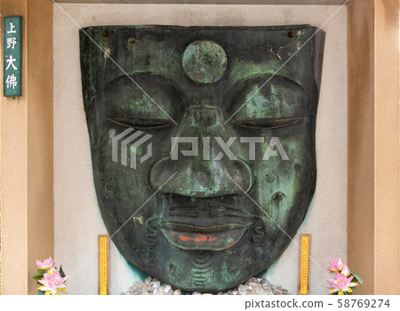 The Face of the Old Great Buddha of Ueno in Tokyo, Japan The Face of the Old Great Buddha of Ueno in Tokyo, Japan 58769274
