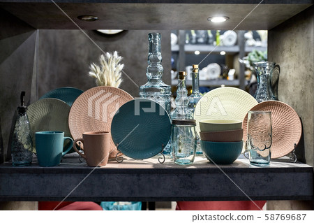 a showcase with the laying of porcelain dishes. Beautiful merchandising, dishes for restaurants and a showcase with the laying of porcelain dishes. Beautiful merchandising, dishes for restaurants and 58769687