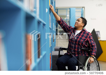 Handicapped Student in Library 58770406