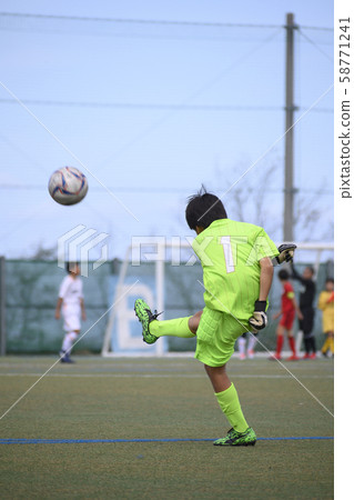 Junior soccer game image keeper Junior soccer game image keeper 58771241