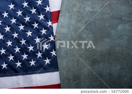USA Flag of United States of America with embroidered stars on table top view 58772000