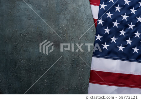 US Flag of United States of America USA with embroidered stars on table top view copy-space. 58772121