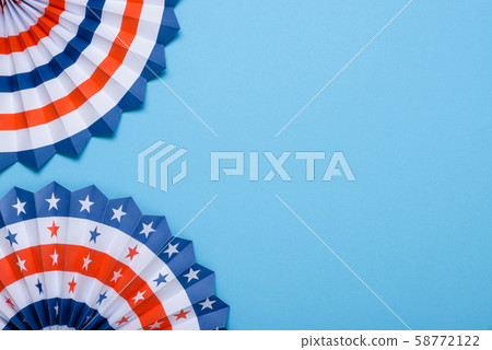 4th of July USA flag theme paper fans on blue background. Independence Day lanterns template. 58772122